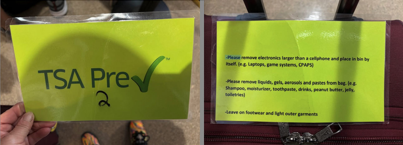 a yellow sign with green check mark on it