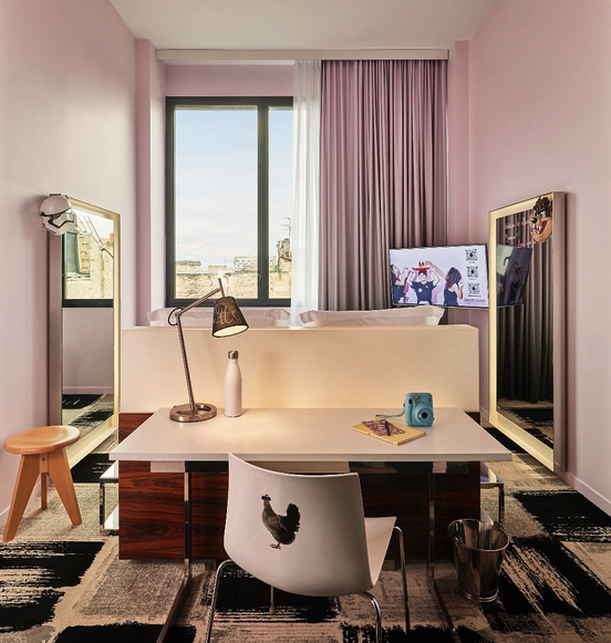 a room with a desk and chair