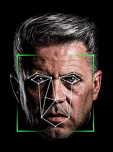 a man with a face grid