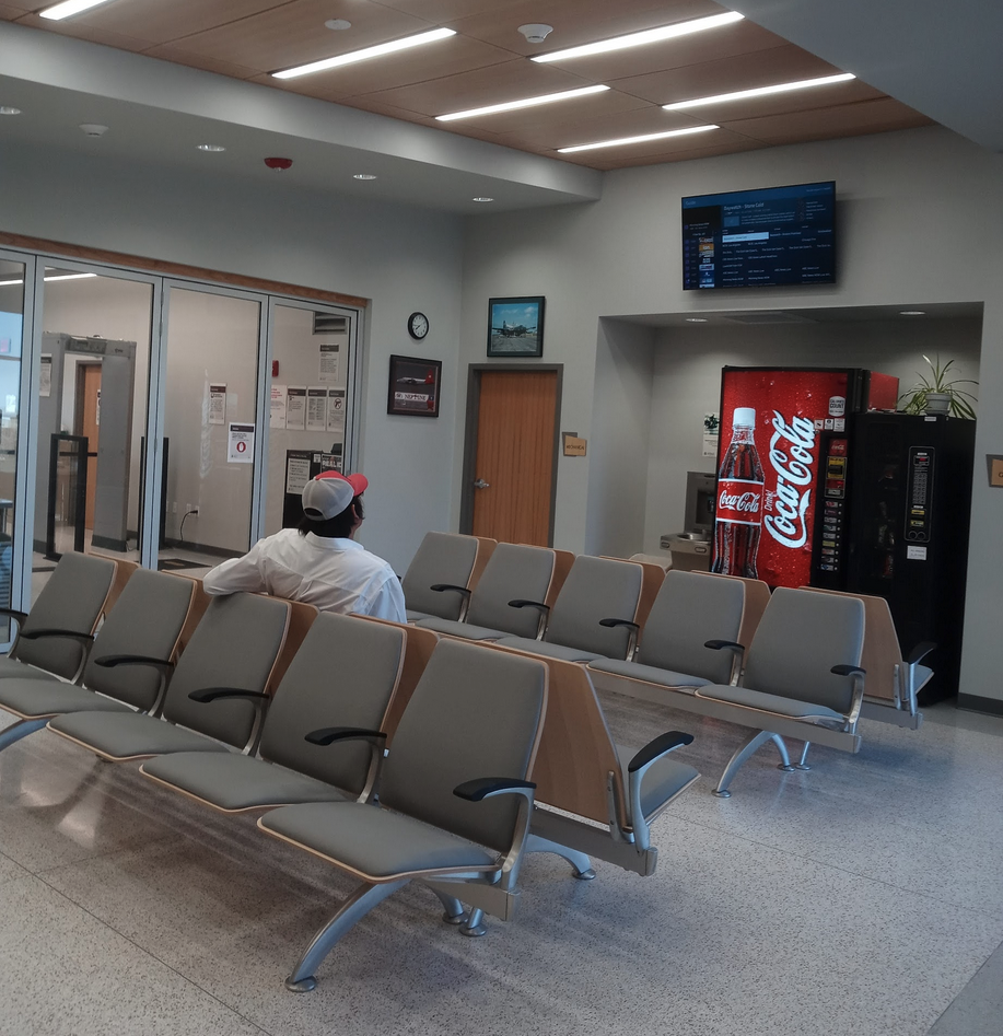a man sitting in a waiting room