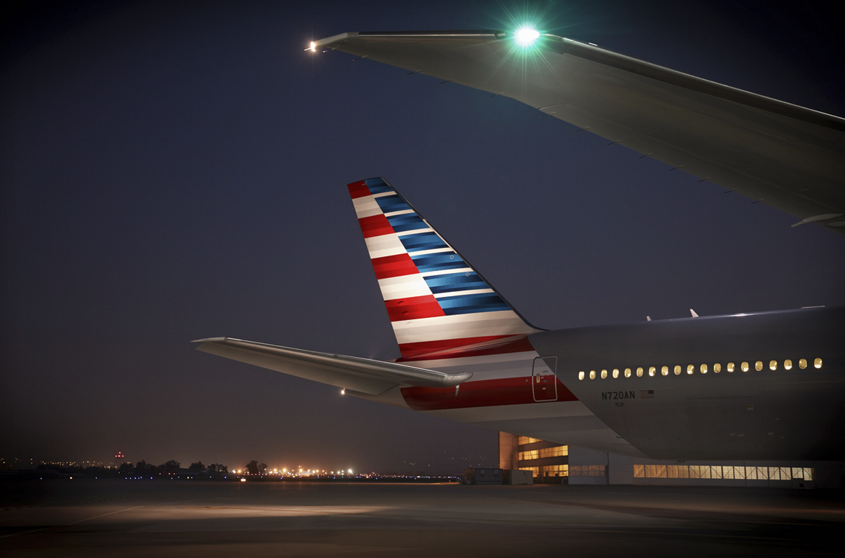 the tail of an airplane at night