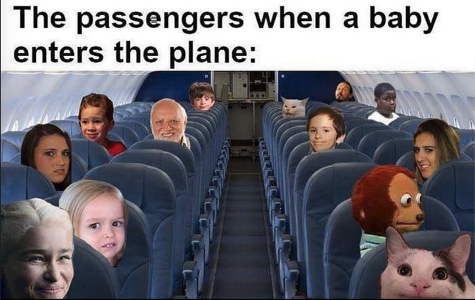 a group of people's faces on seats