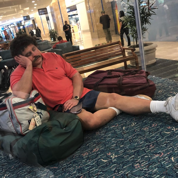 a man sleeping on the floor