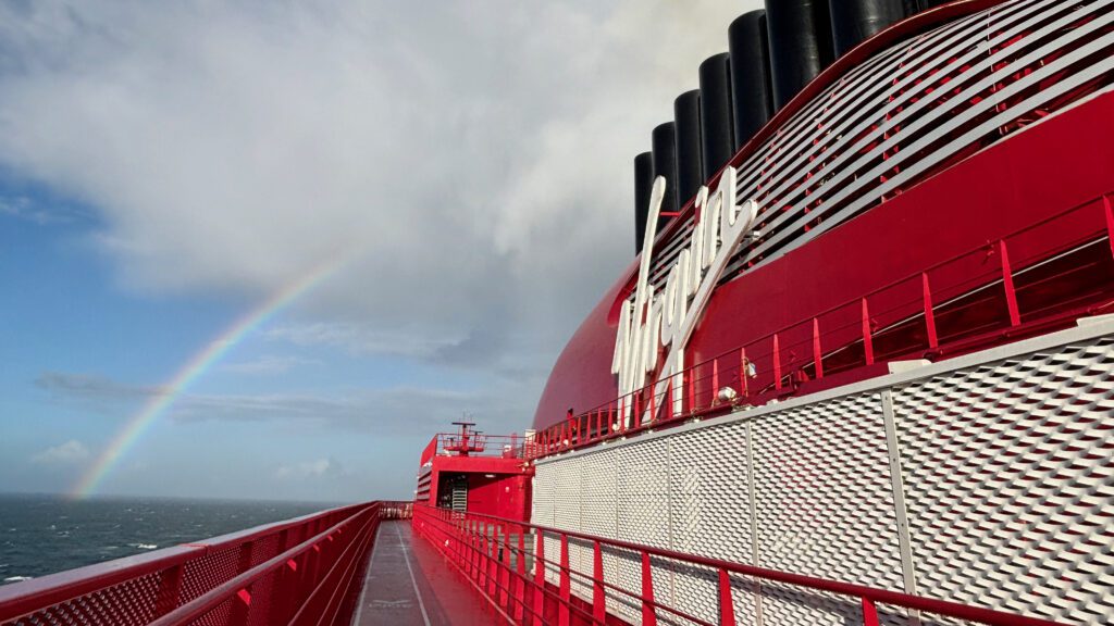 a rainbow over a ship