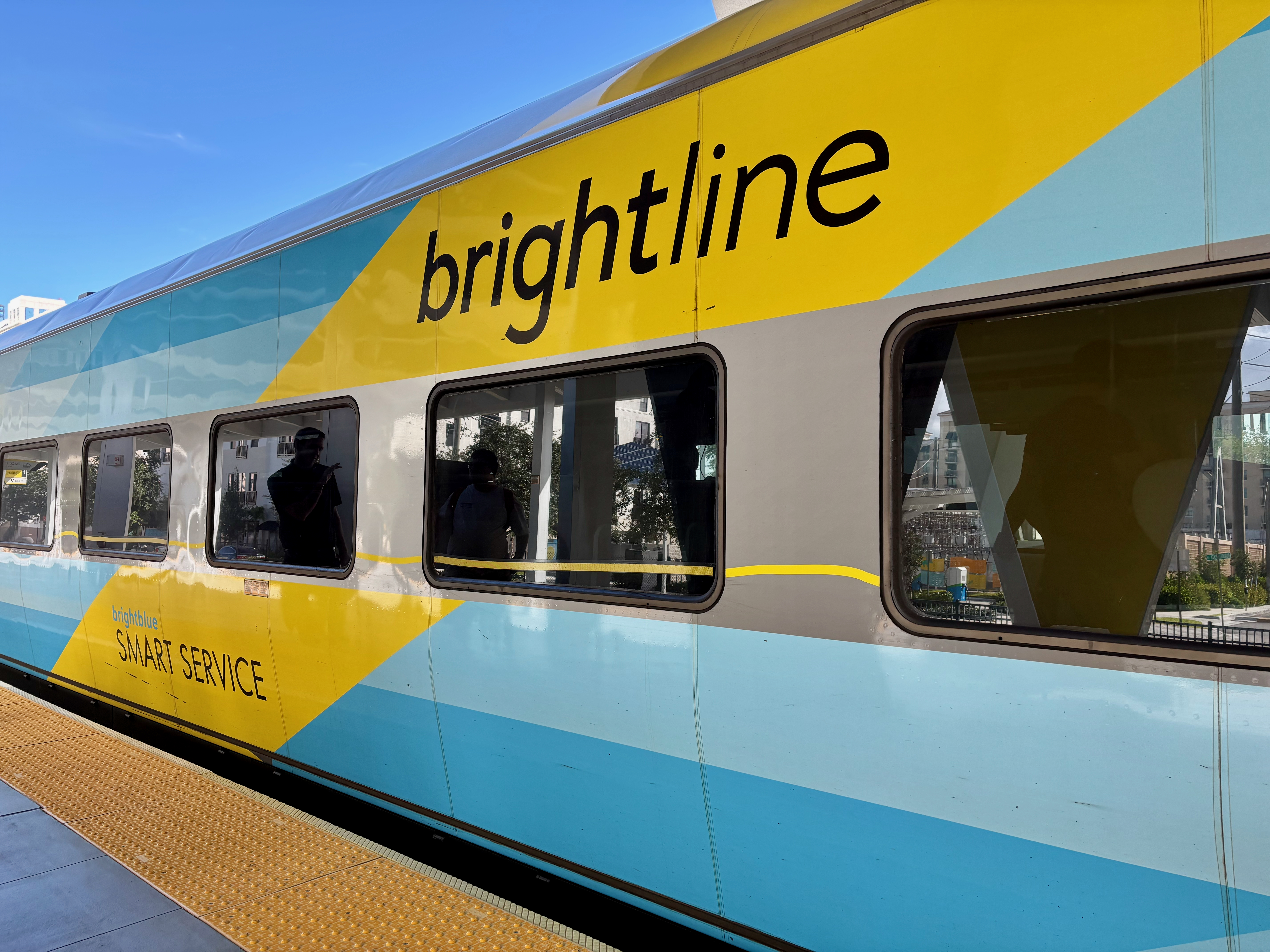 Brightline train car at the platform