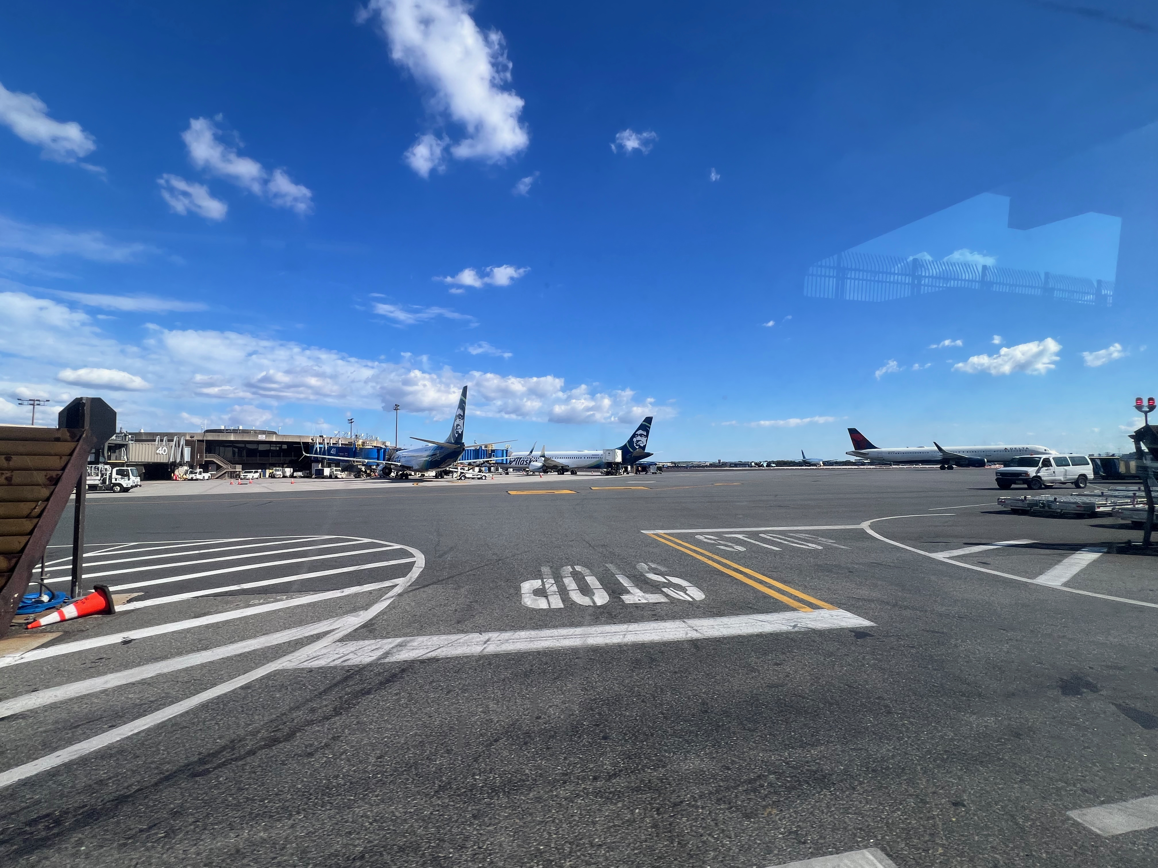 a group of airplanes on a runway