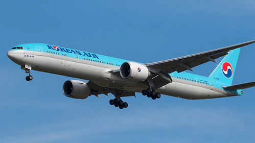 a plane flying in the sky