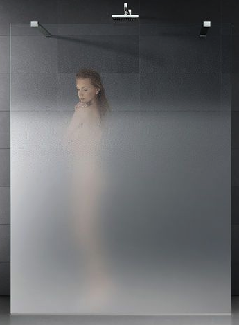a woman standing in a shower
