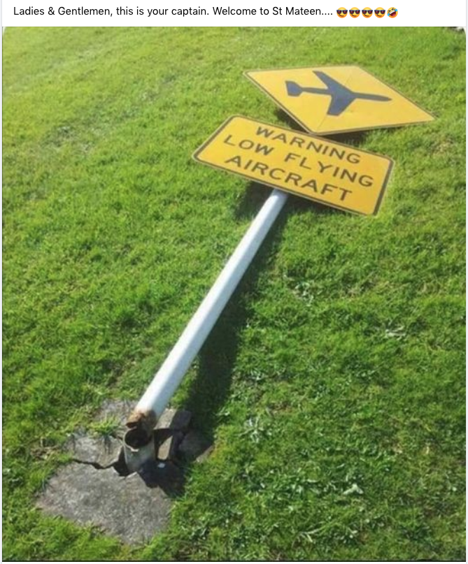 a sign on a pole