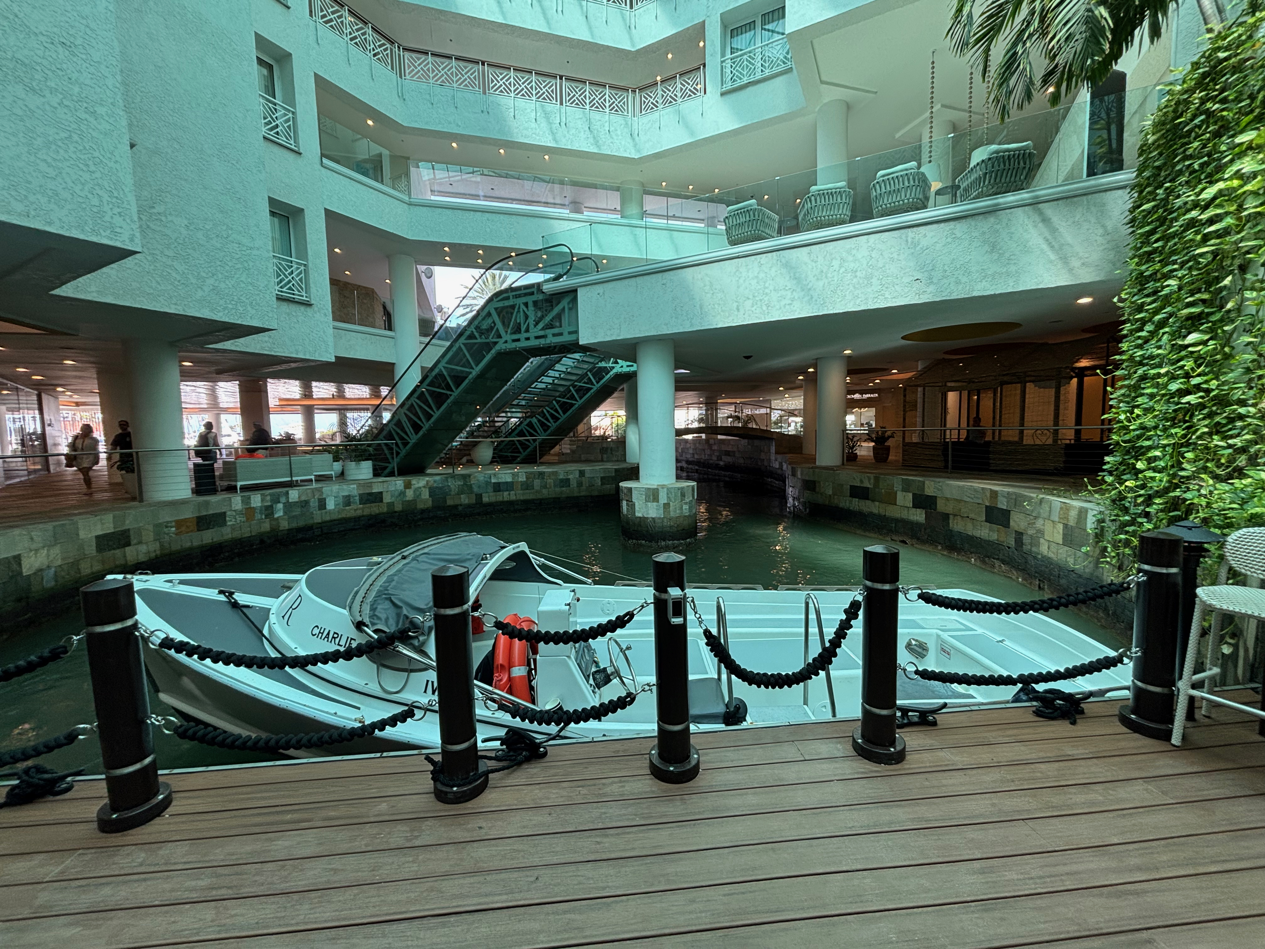 a boat in a canal inside a building