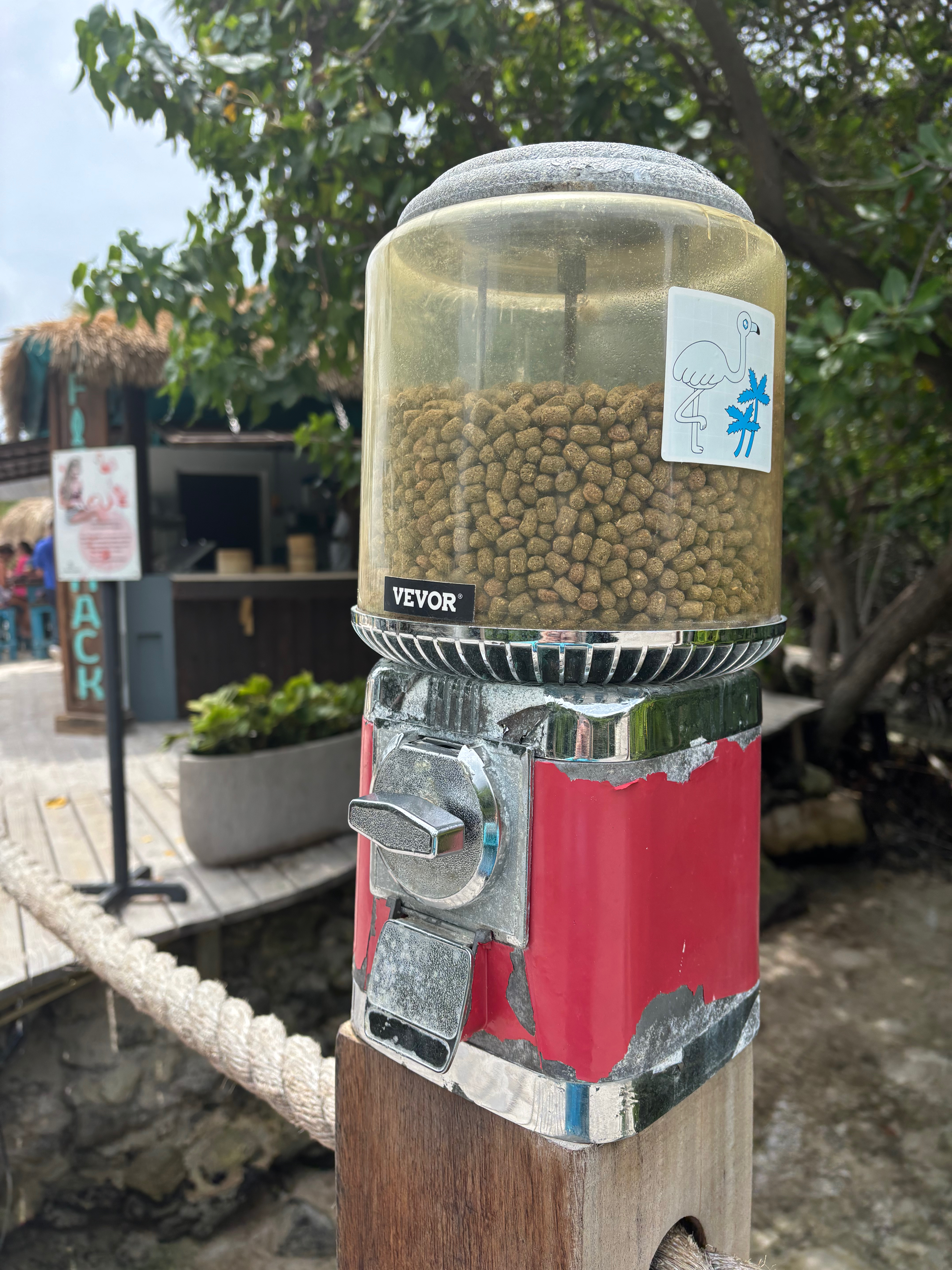 a vending machine with a plastic container filled with food