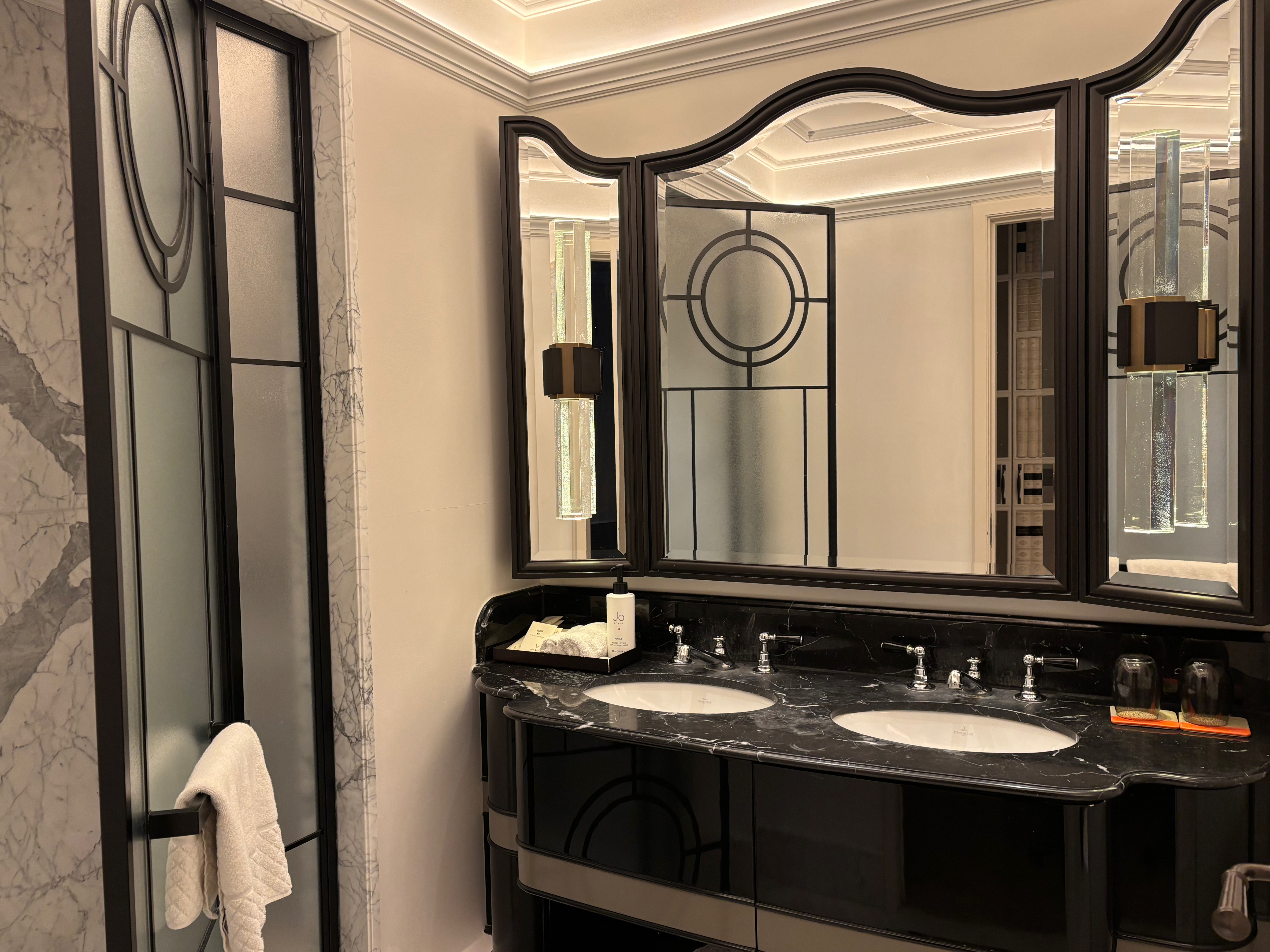 a bathroom with a mirror and sinks