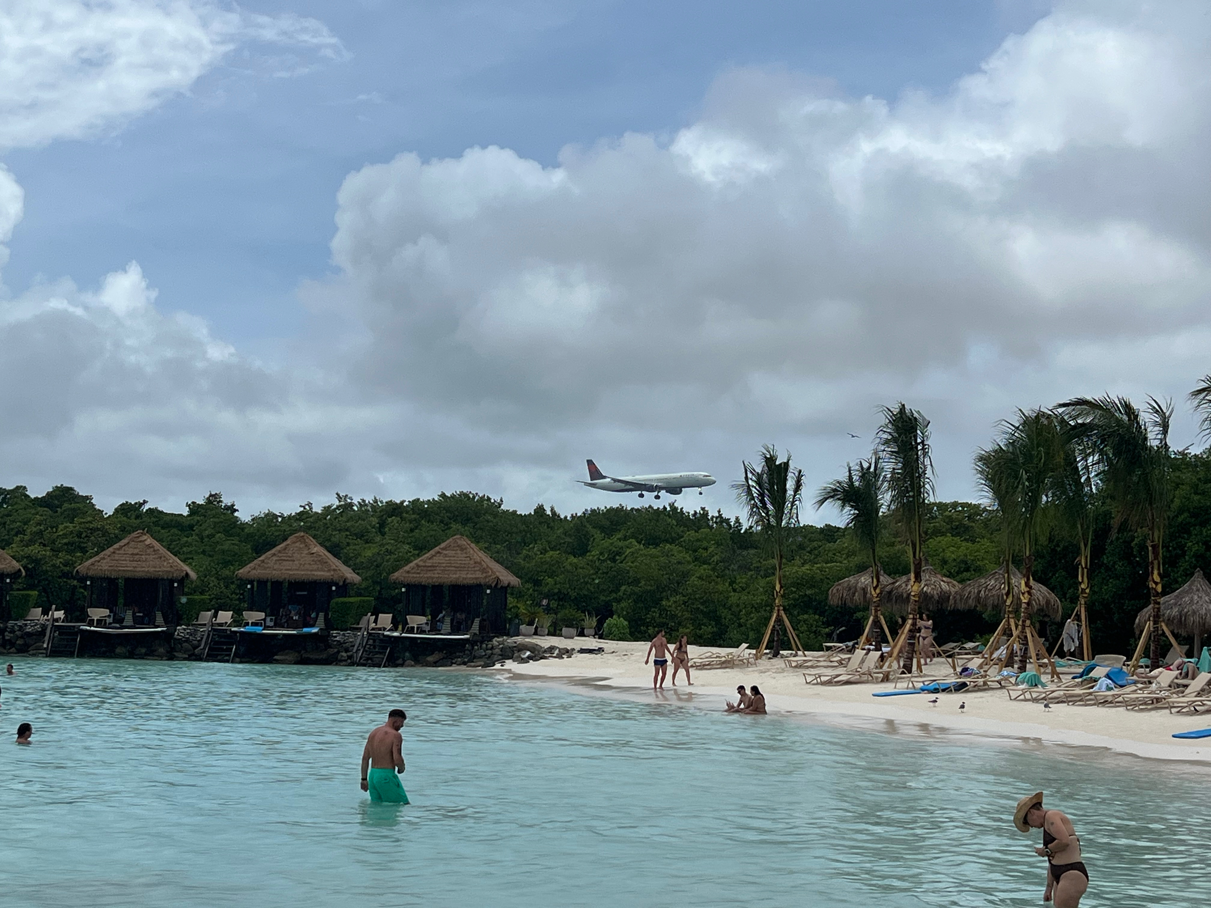 a plane flying over a body of water