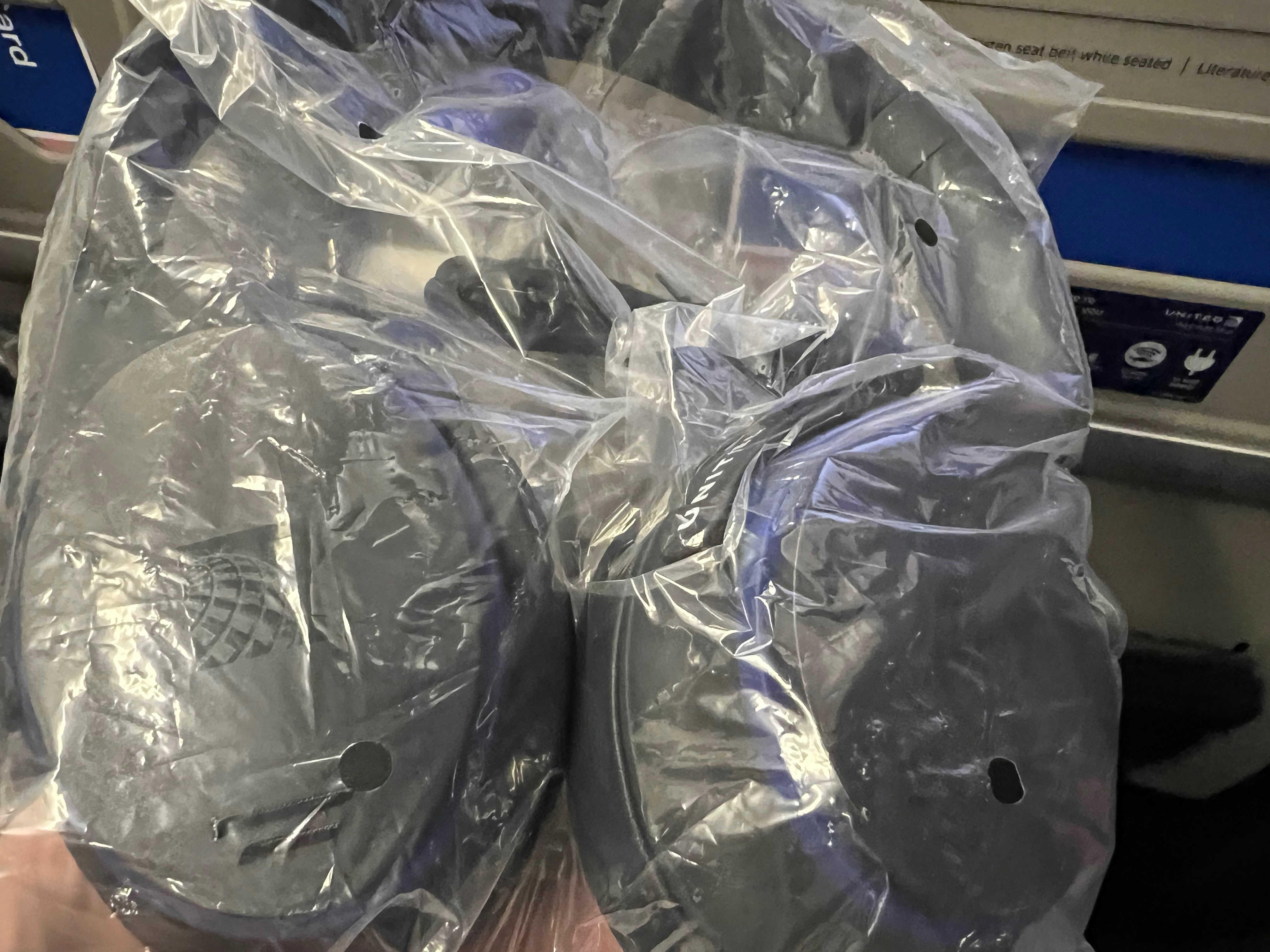 a plastic bag with a couple of round objects in it