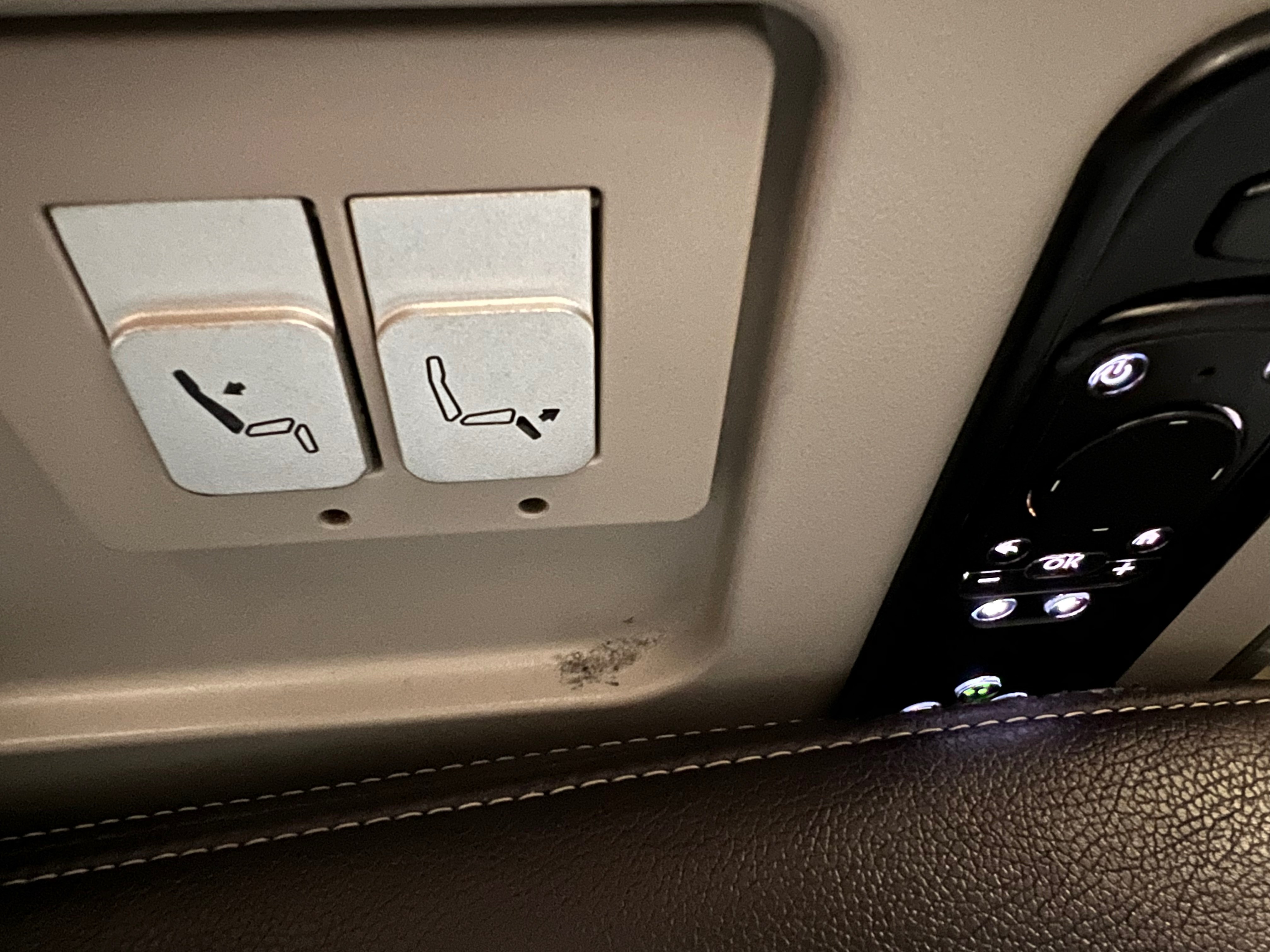 a seat switches and buttons in a car