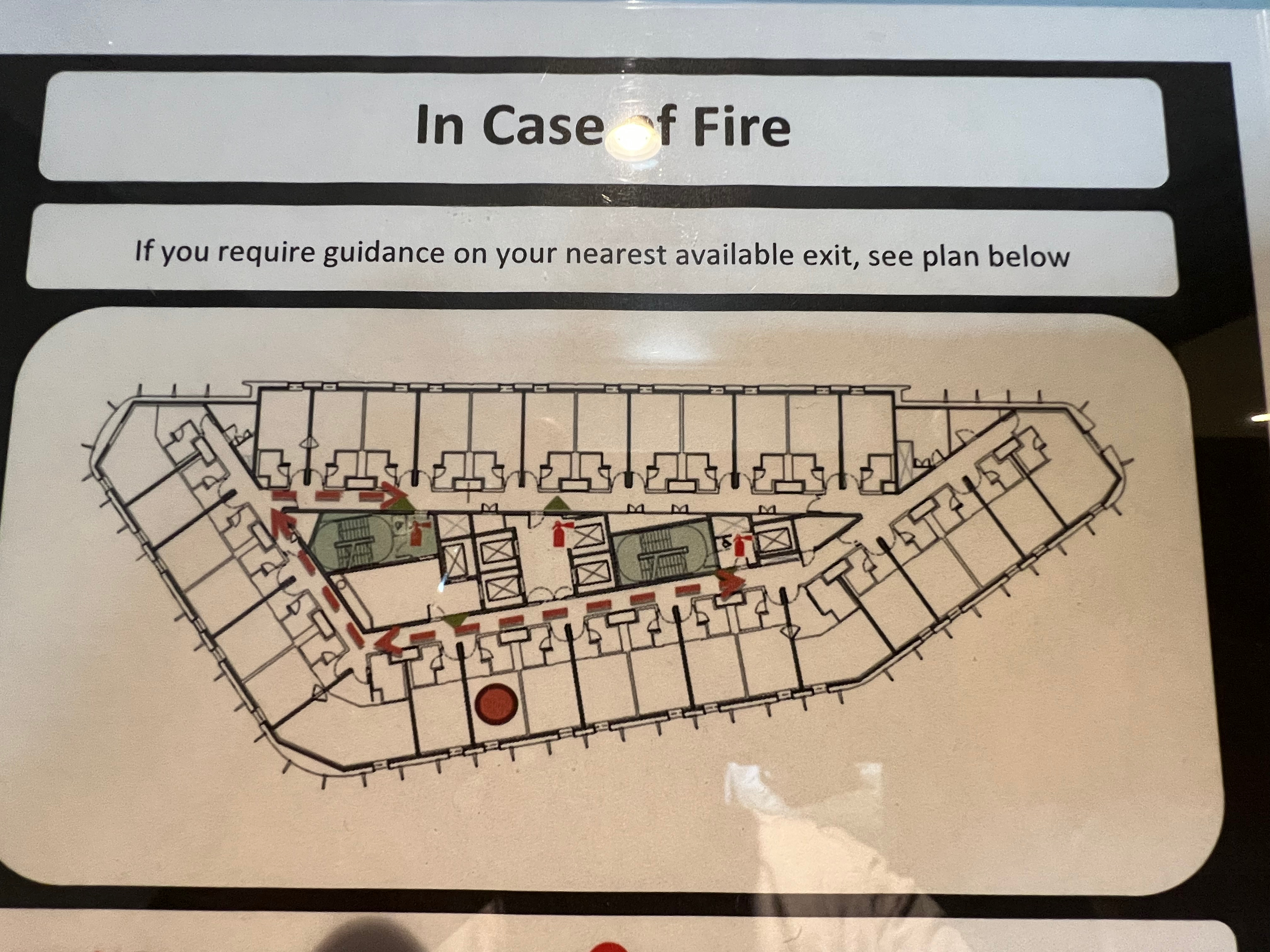 a sign with a map of a building