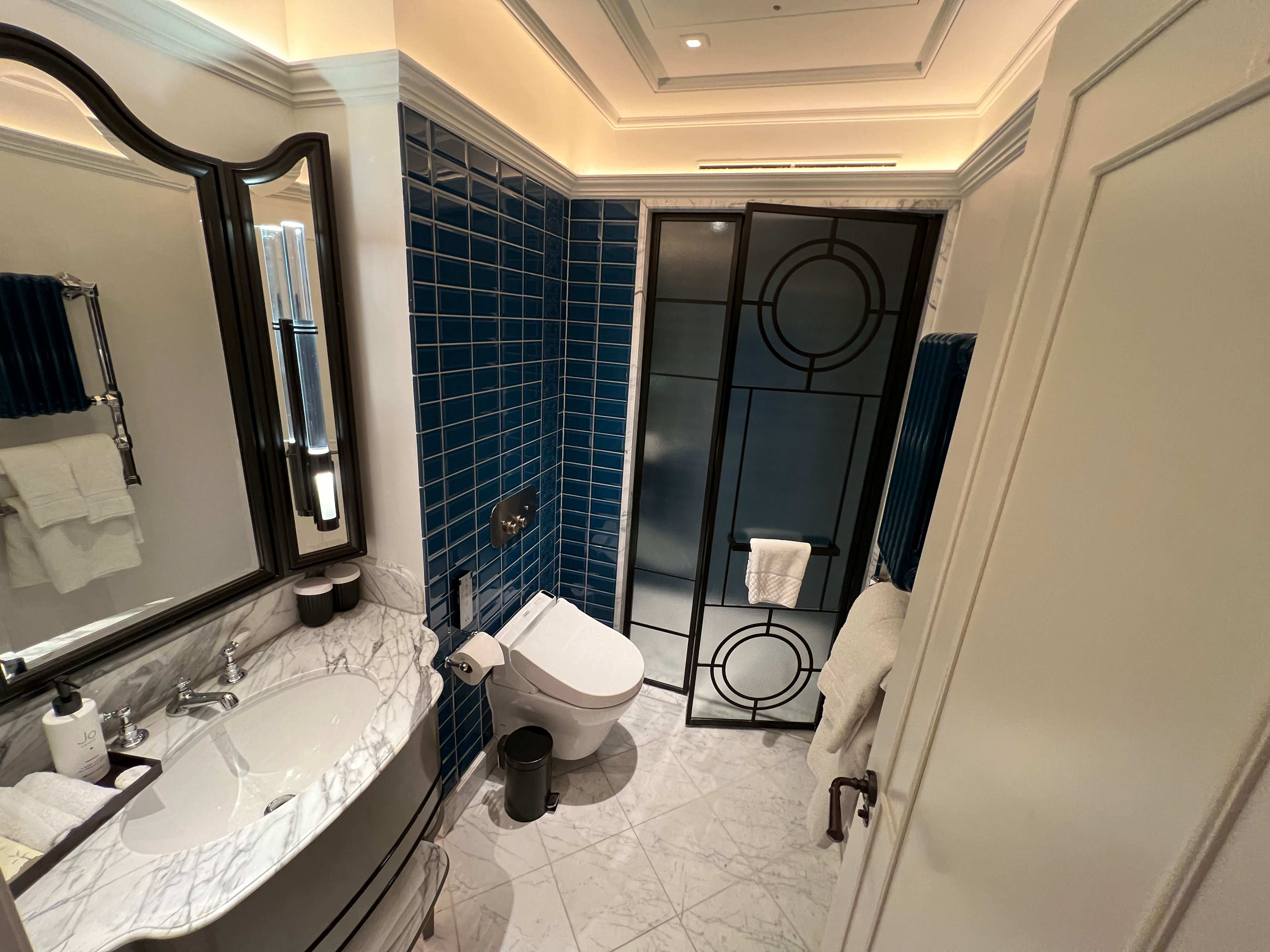 a bathroom with a sink and toilet