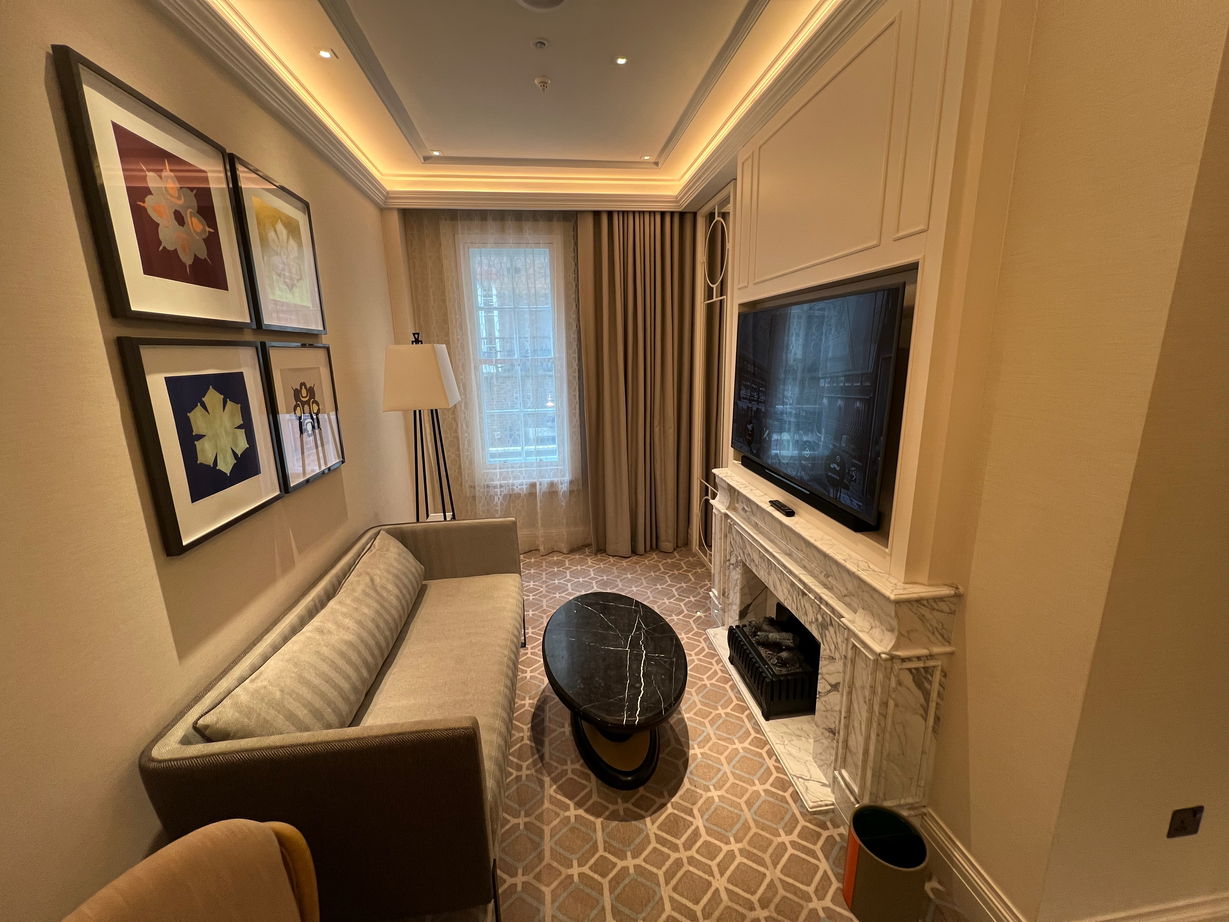 a living room with a tv and a couch