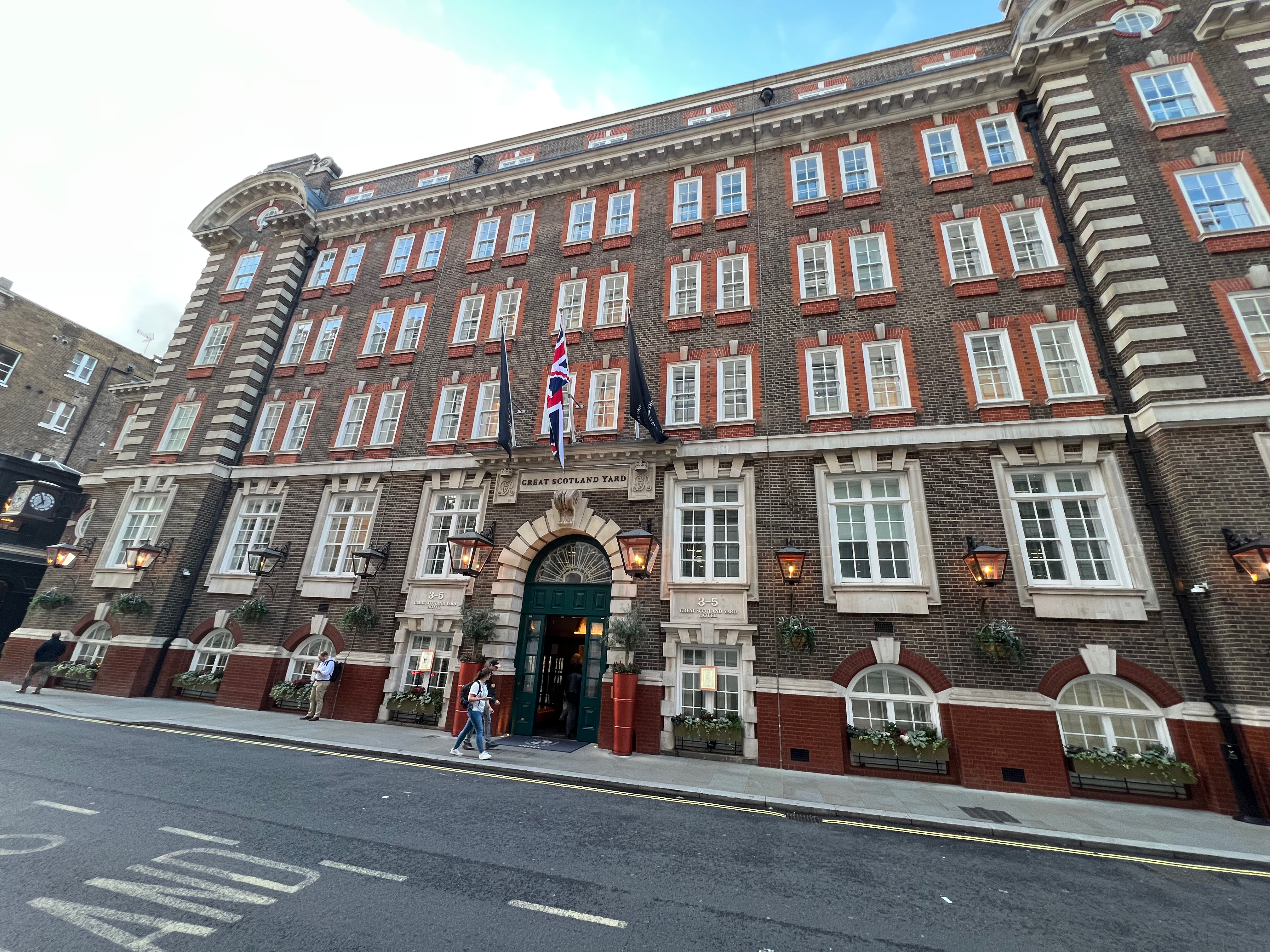 a building with flags on the front