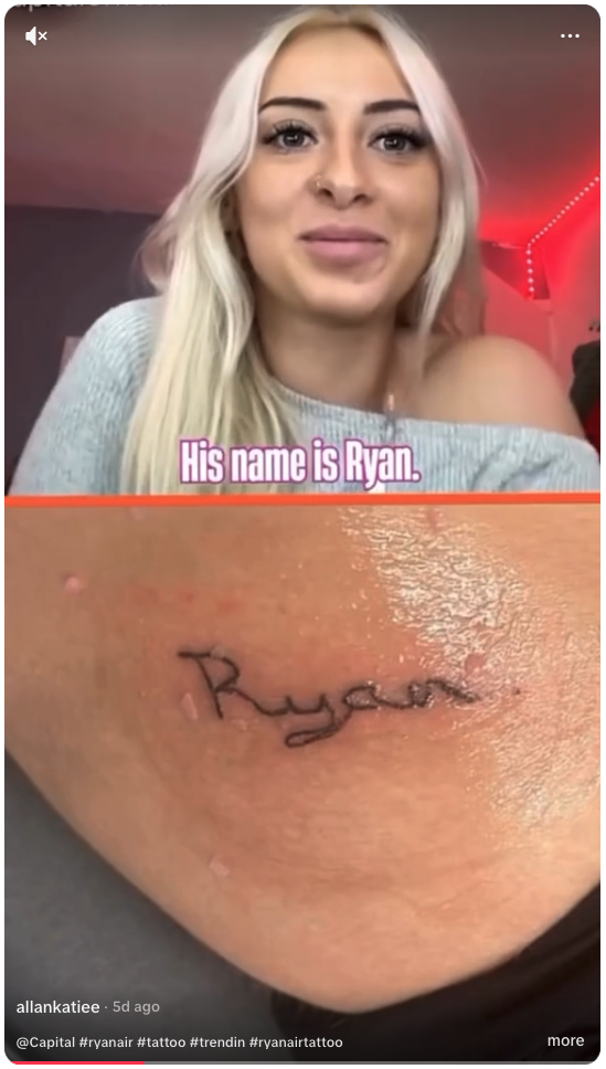 a woman with a tattoo on her shoulder