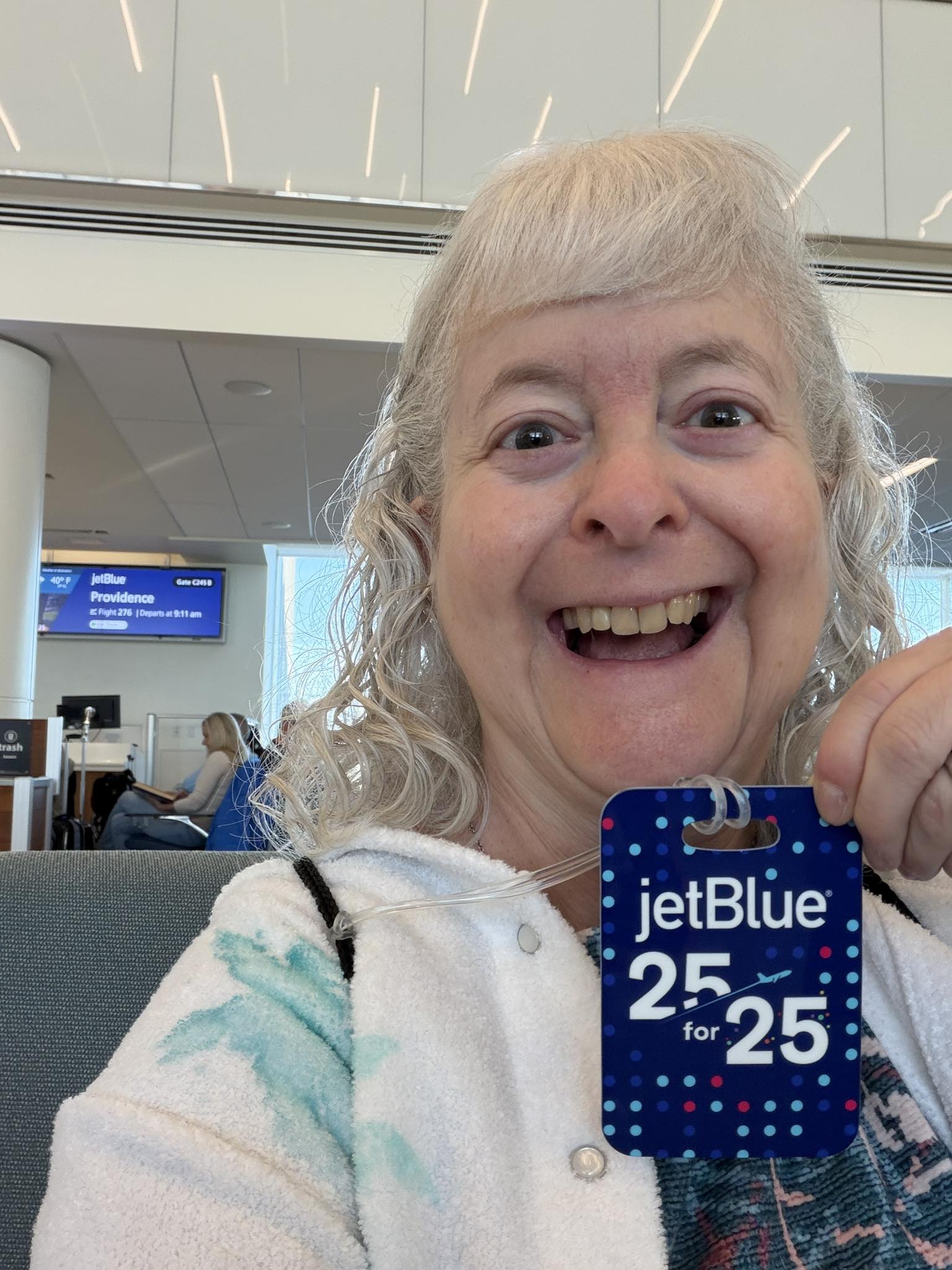 a woman smiling at camera