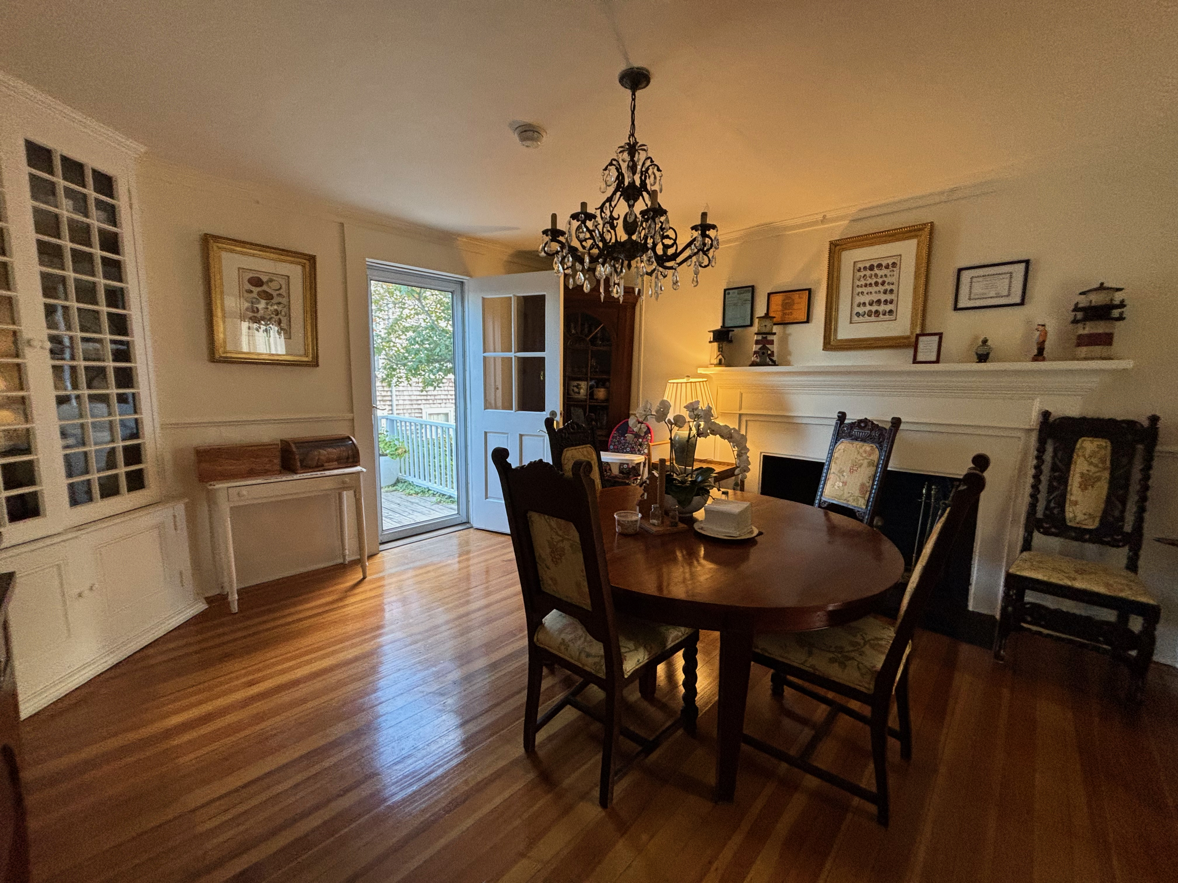 a dining room with a table and chairs