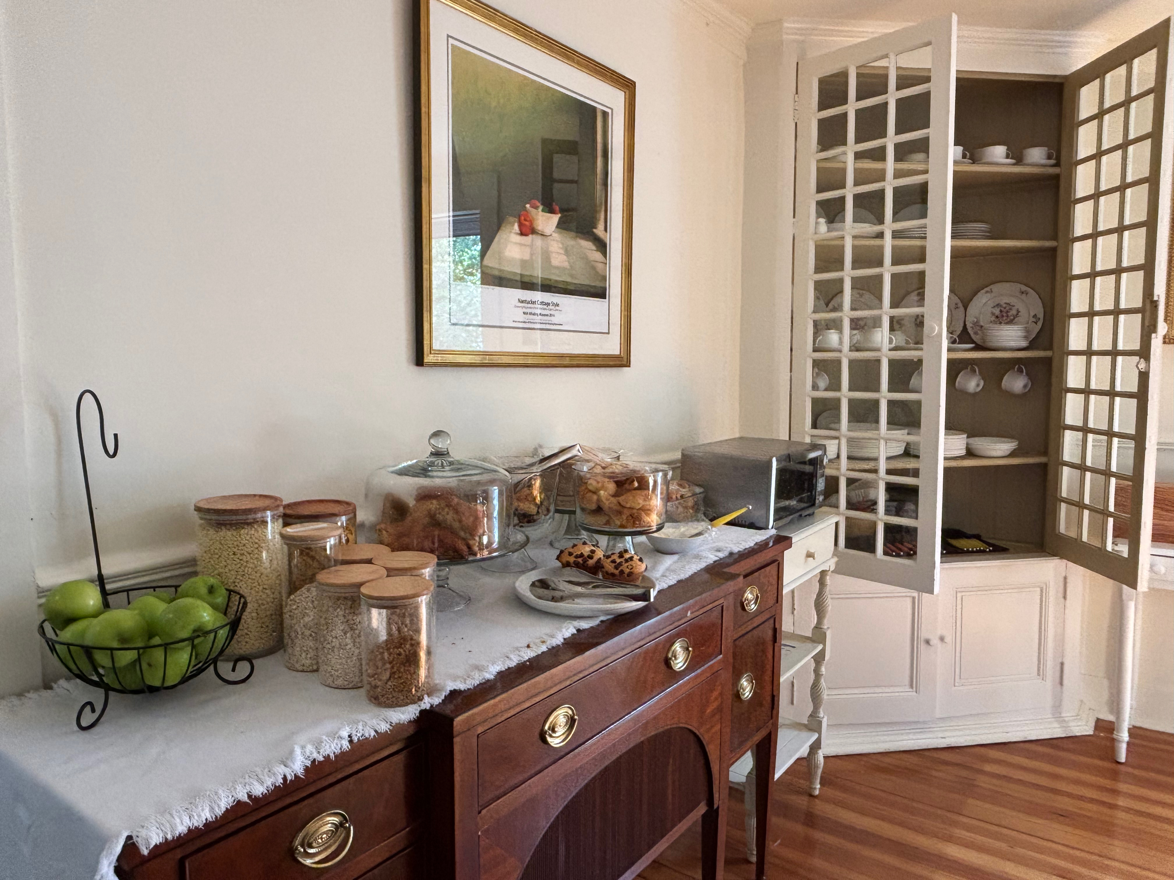 a kitchen with a buffet and food