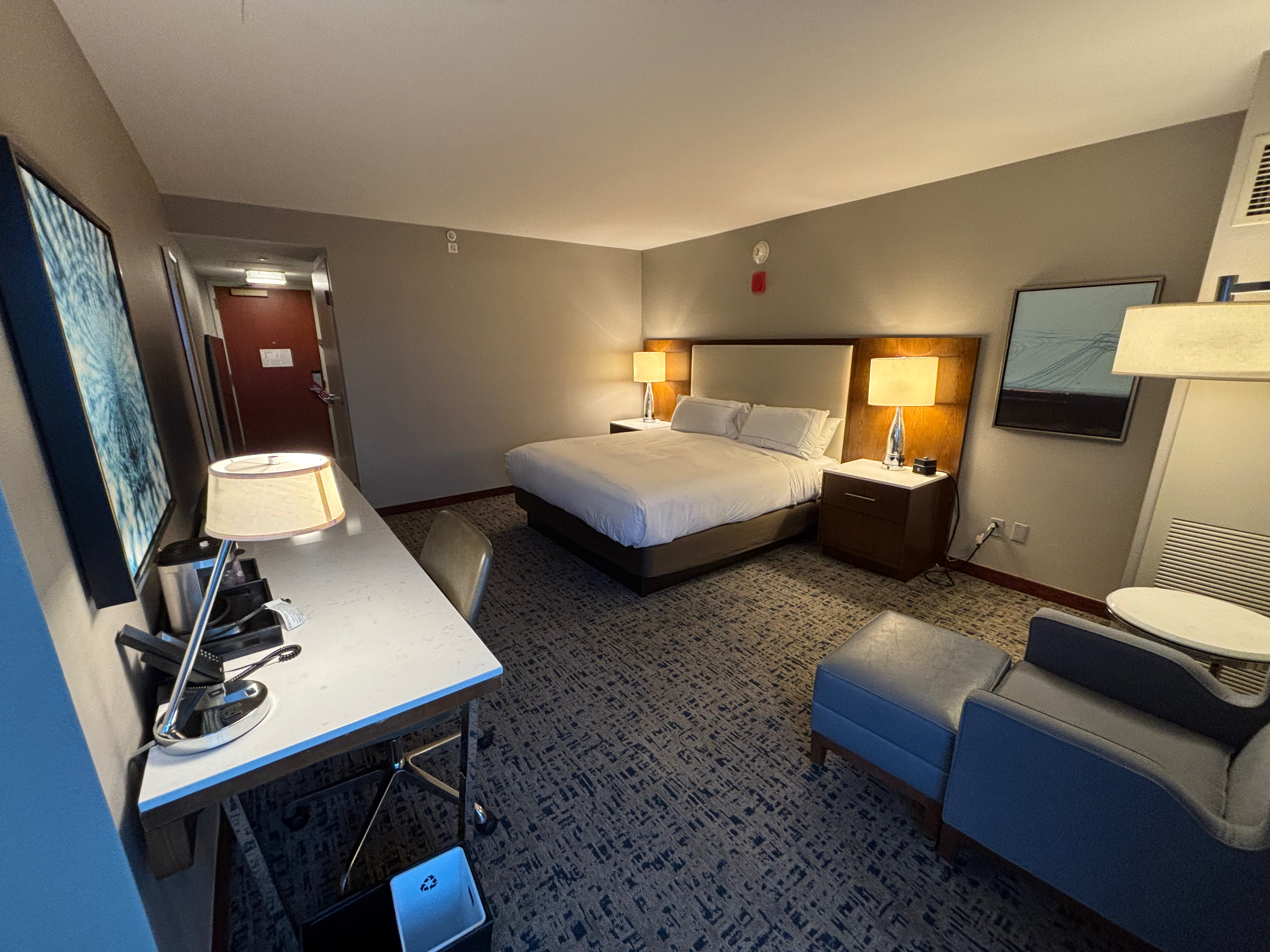 a room with a bed and a chair