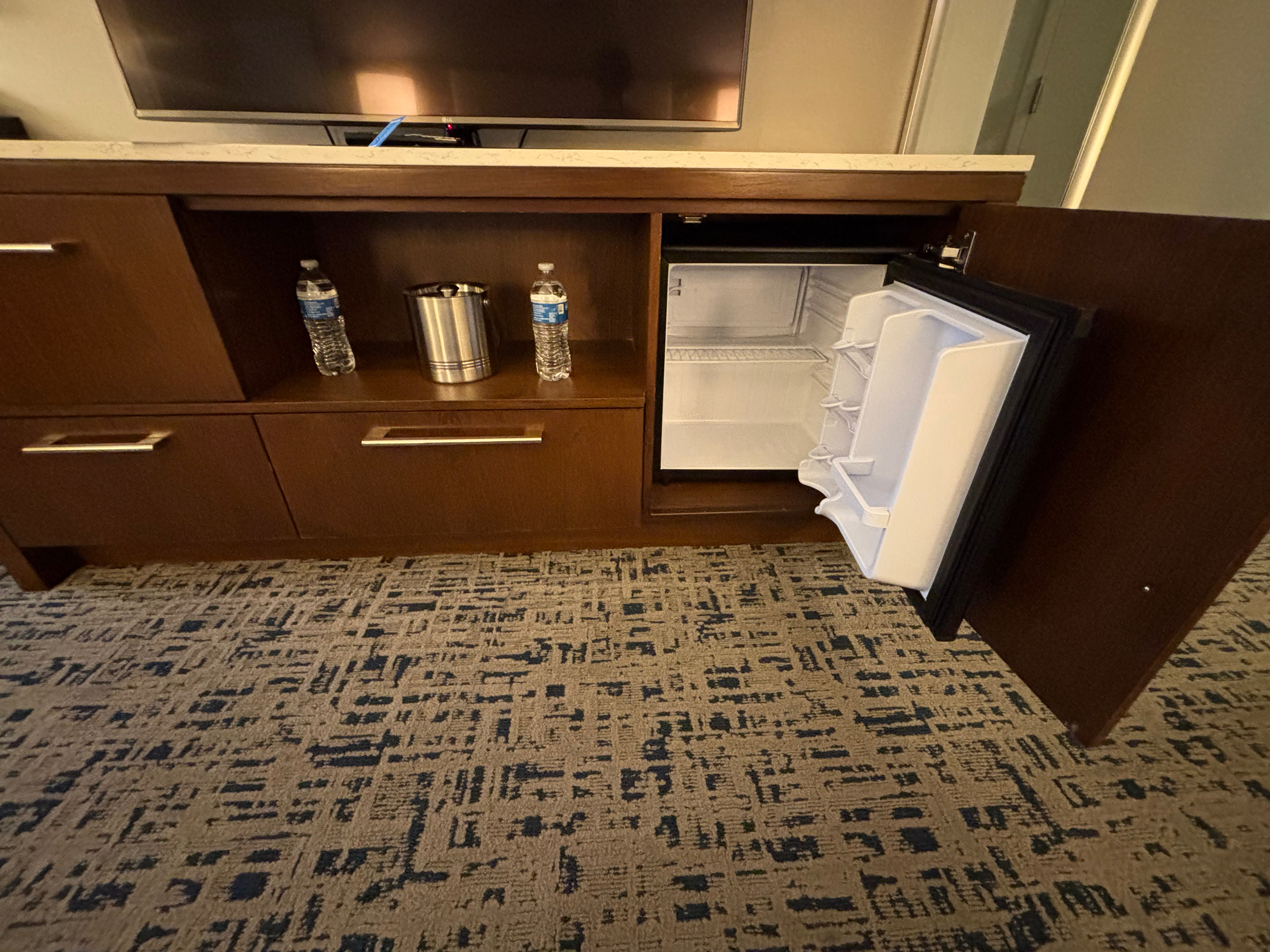 a small refrigerator in a room