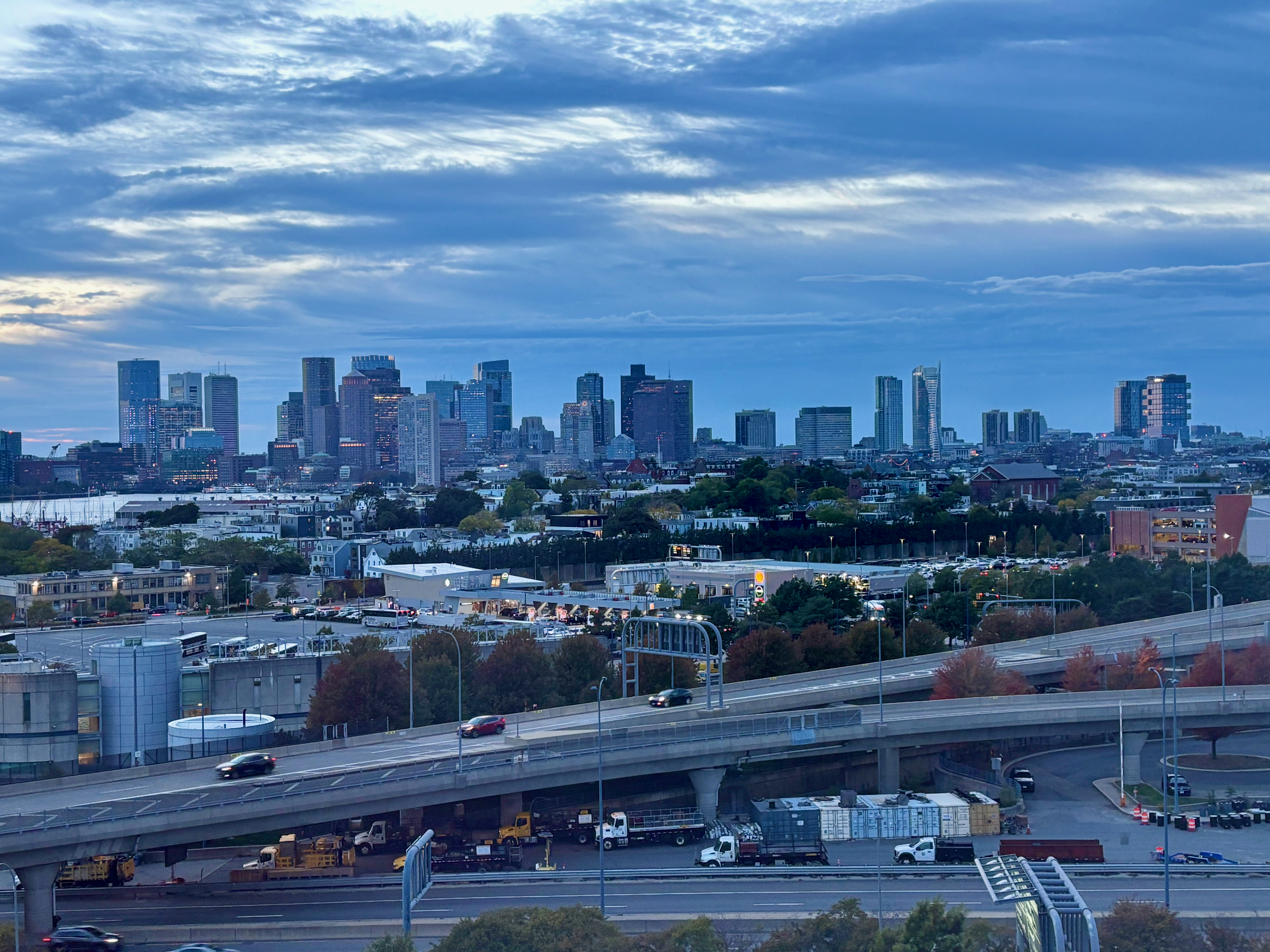 a city with a bridge and a city skyline