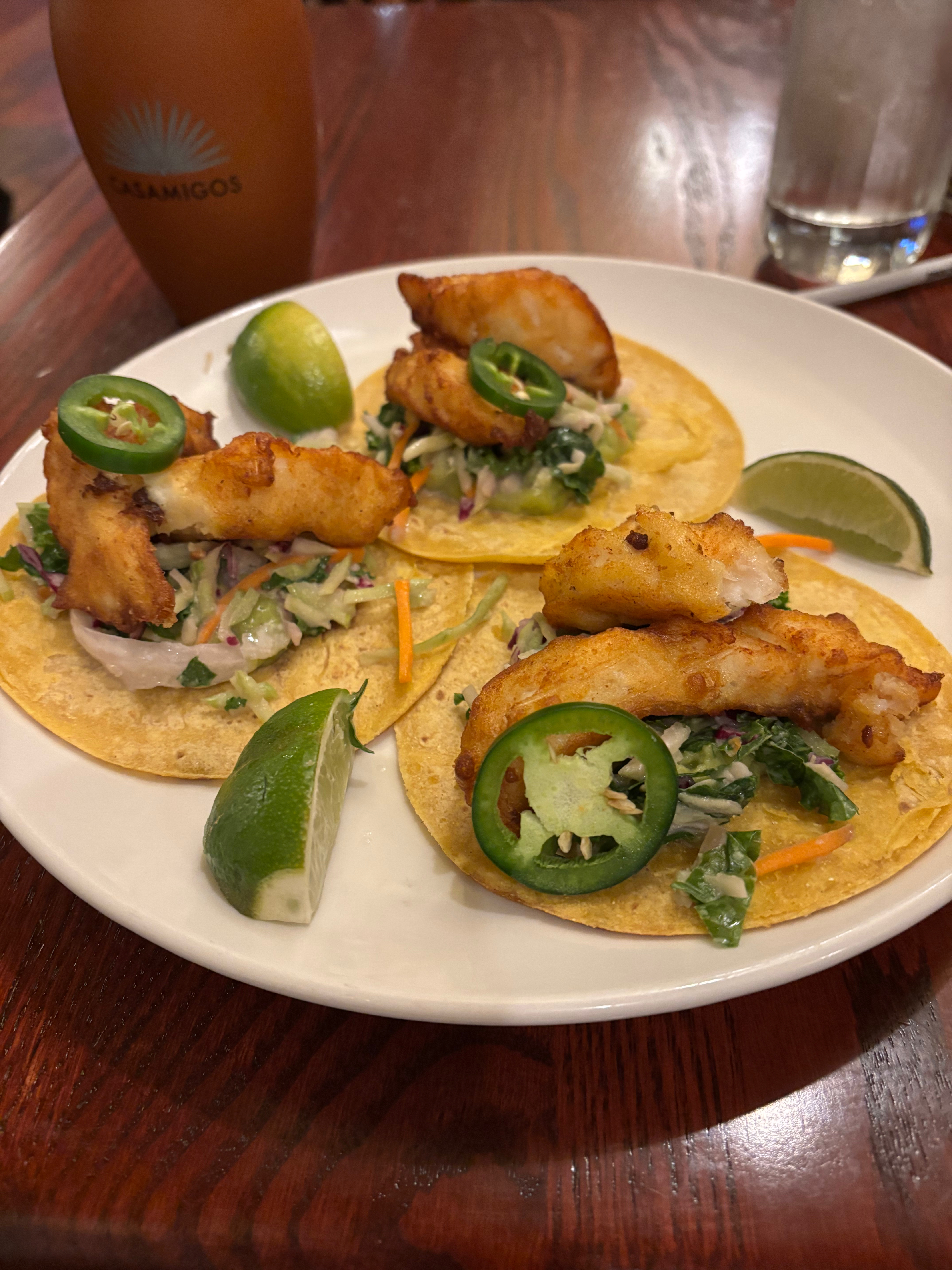 a plate of tacos on a table