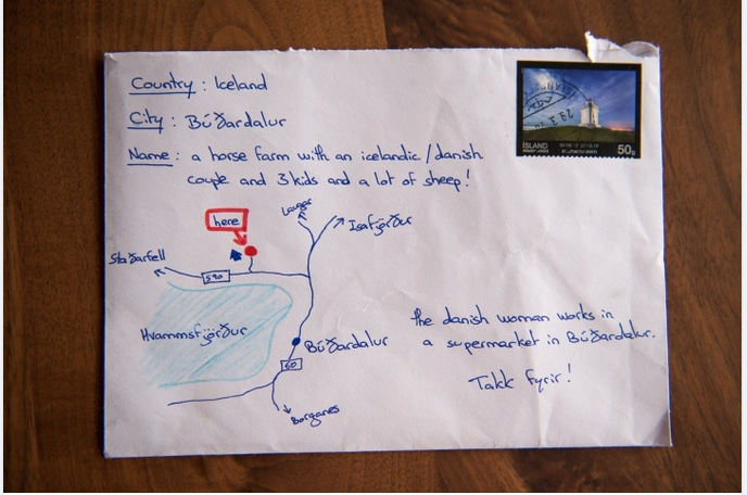 a piece of paper with blue writing on it