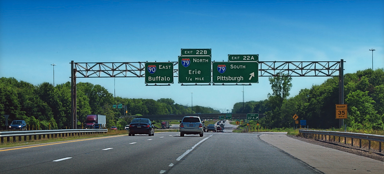a highway with signs on it