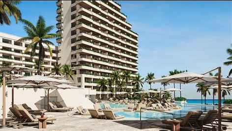 a pool with lounge chairs and umbrellas