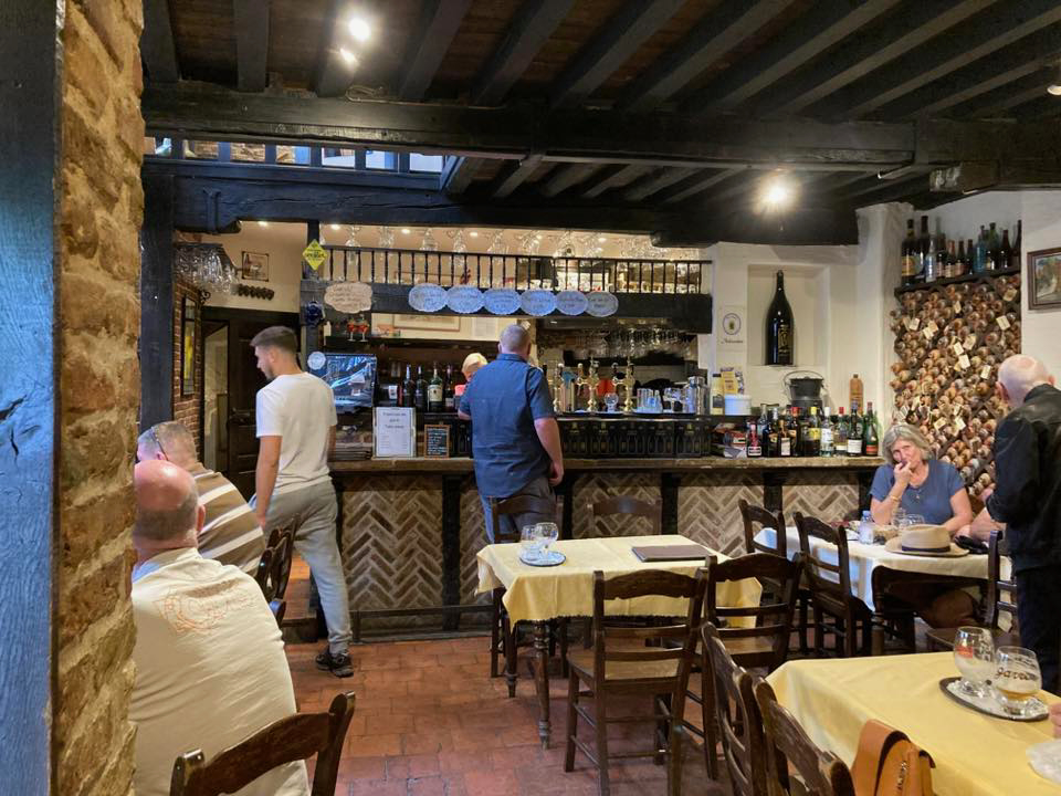 a group of people at a bar