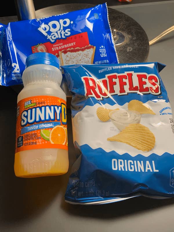 a bag of chips and a bottle of juice