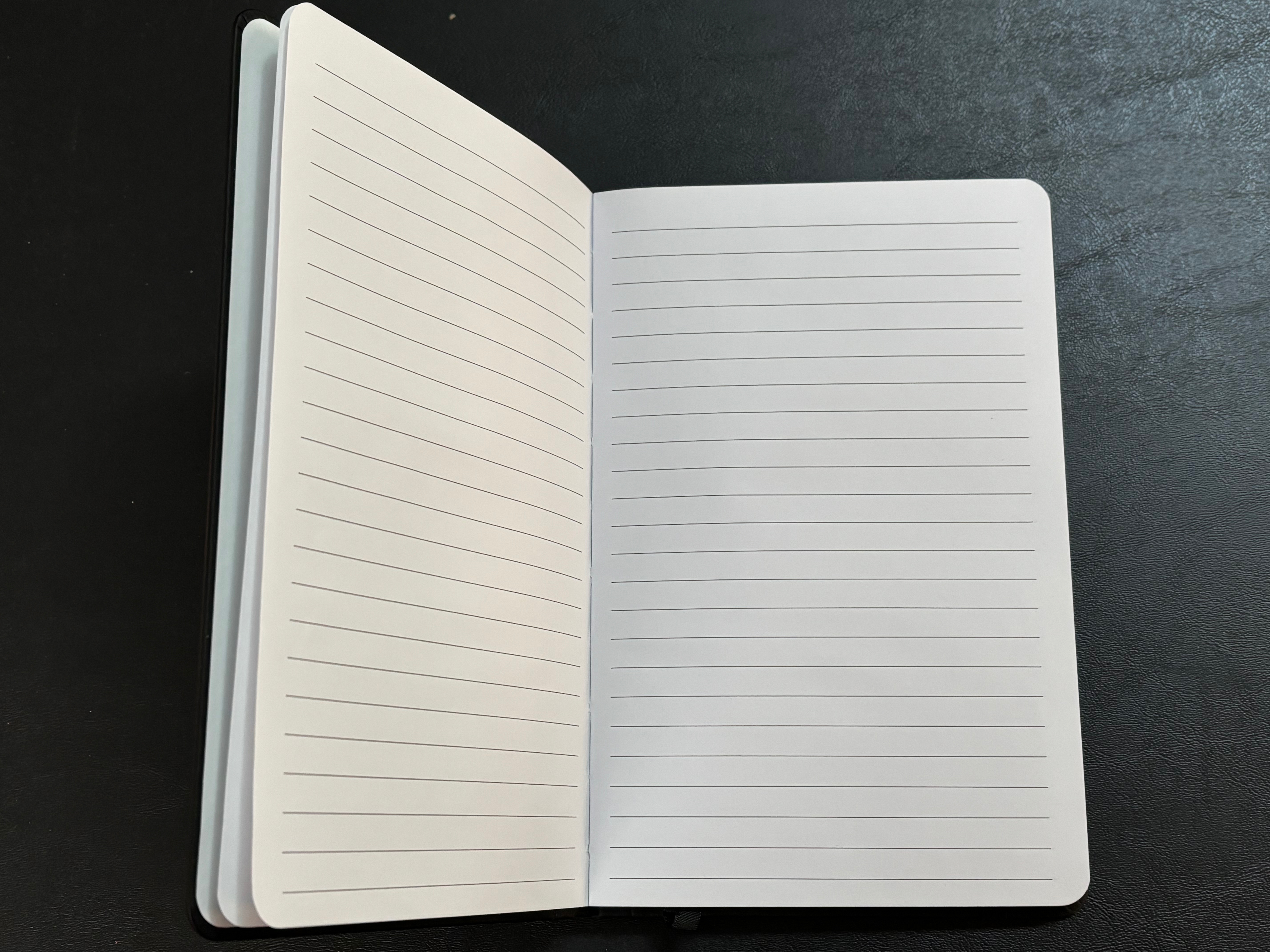 a notebook with lined pages