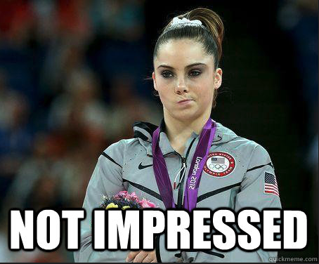 a woman wearing a silver medal