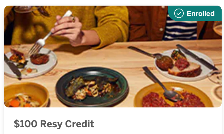 a person eating food at a table