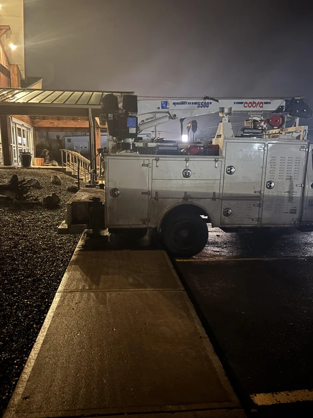 a white truck parked in a parking lot