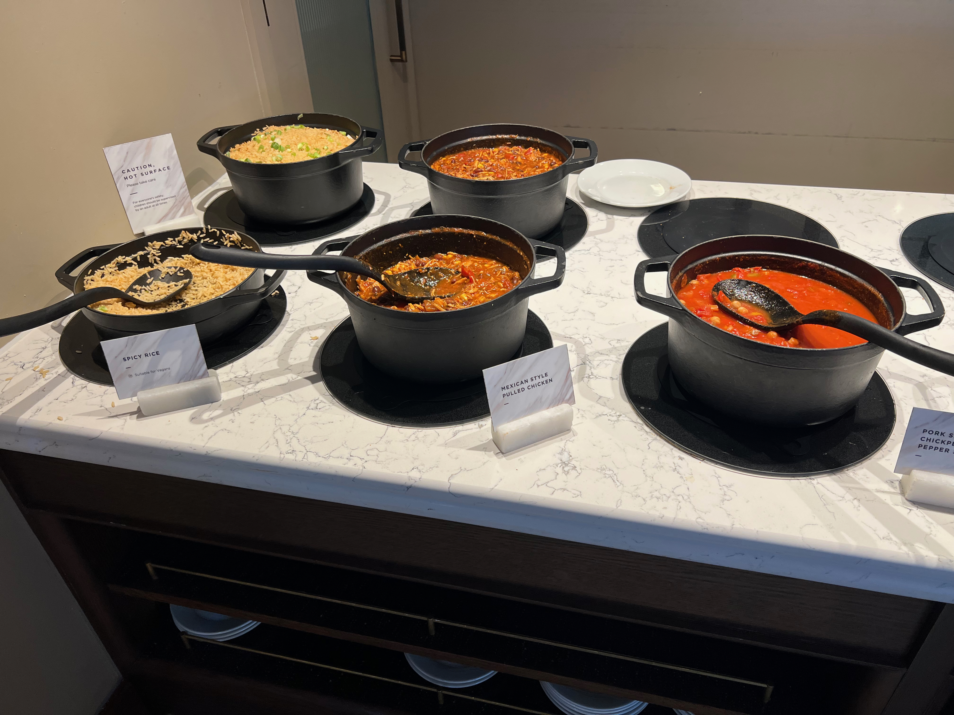 Close-up of hot dishes on the buffet line at the No1 Lounge