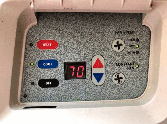 a control panel with buttons and switches