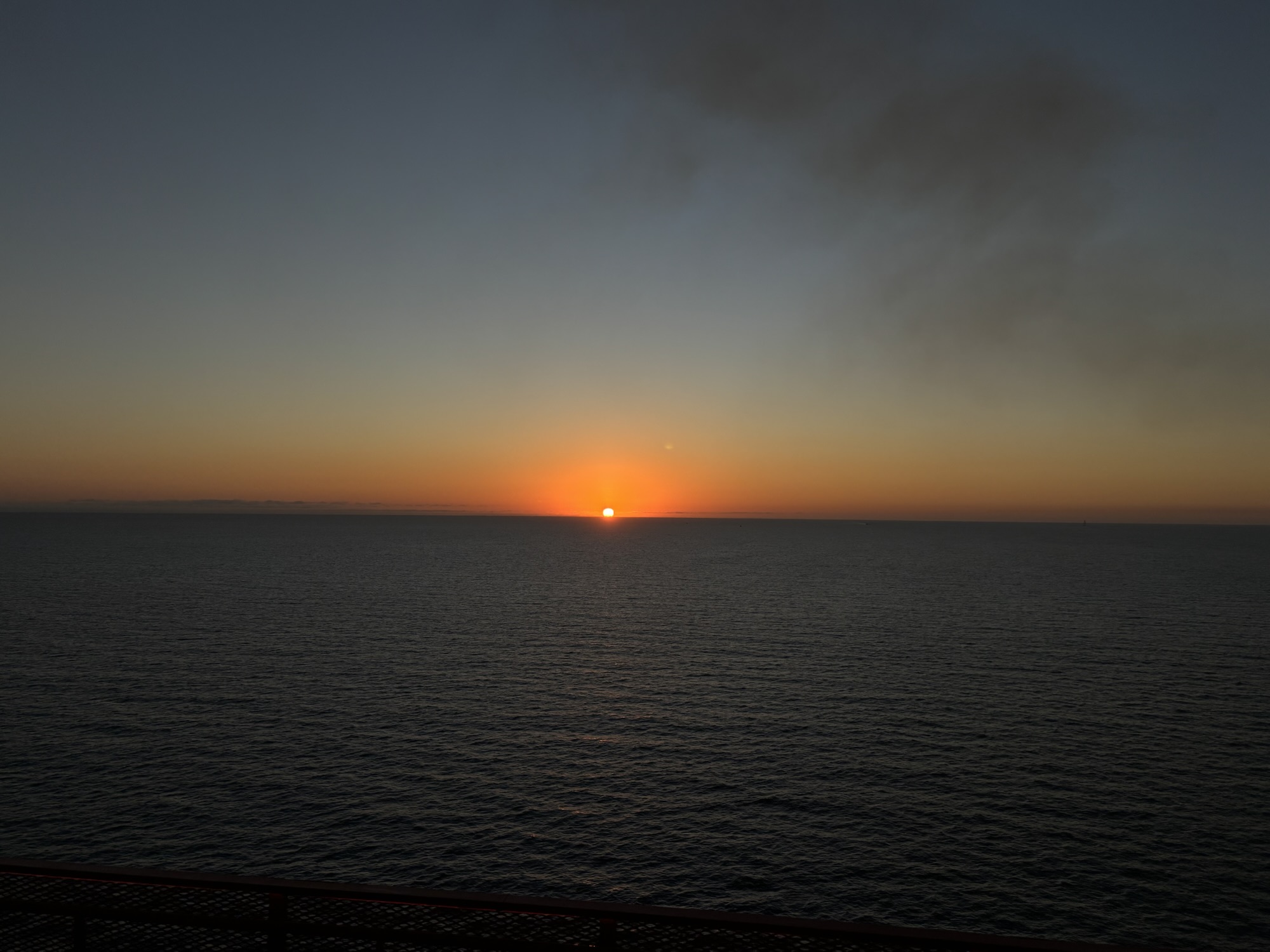 a sunset over the ocean