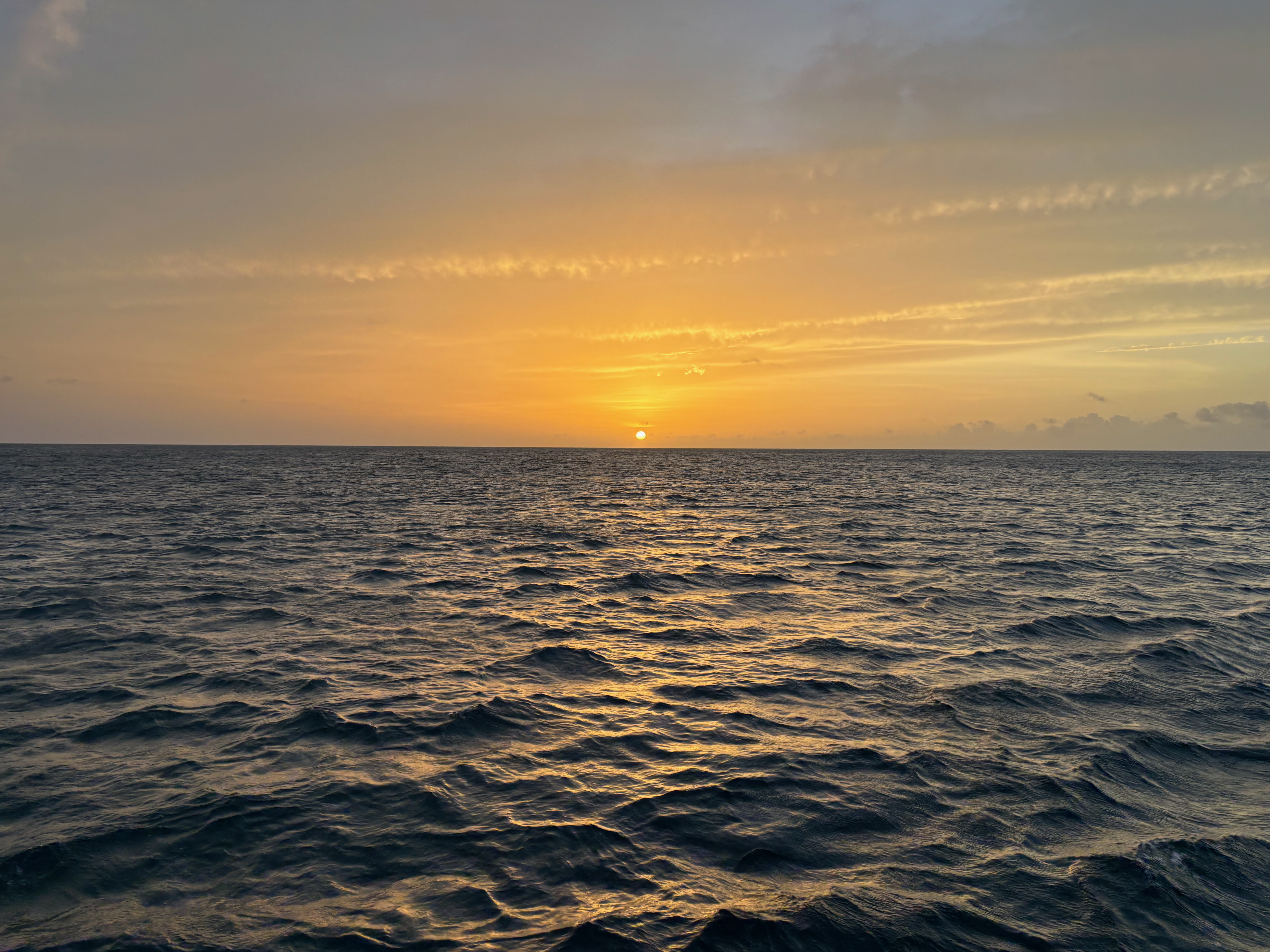 a sunset over the ocean