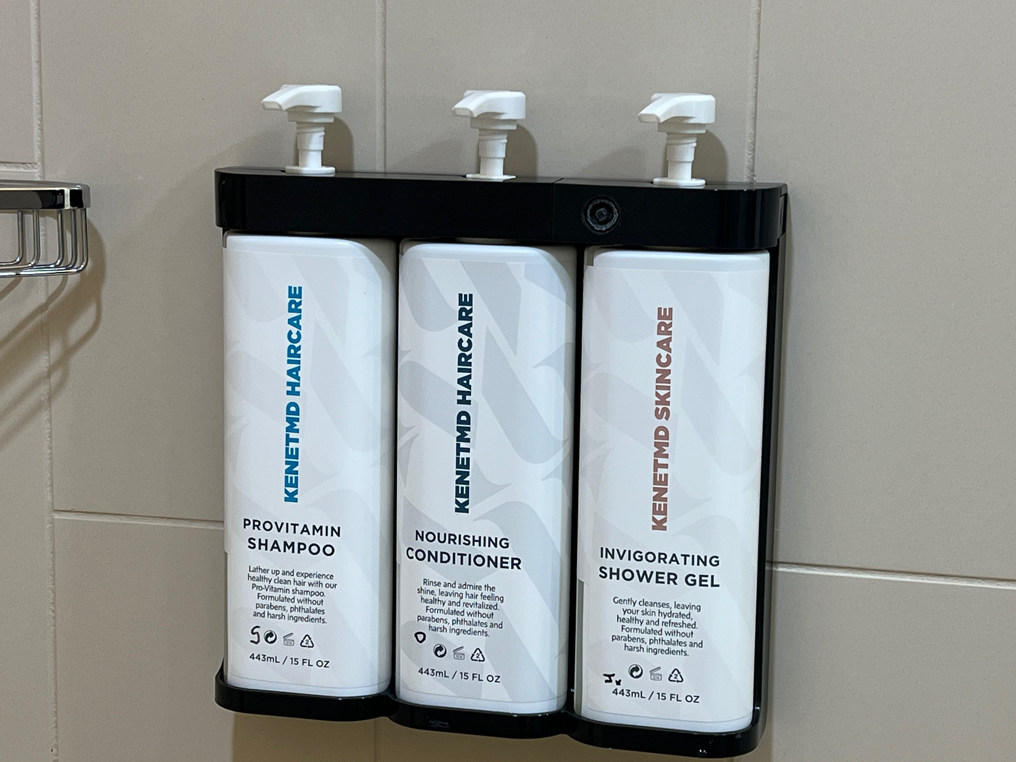 a group of shampoo bottles on a wall