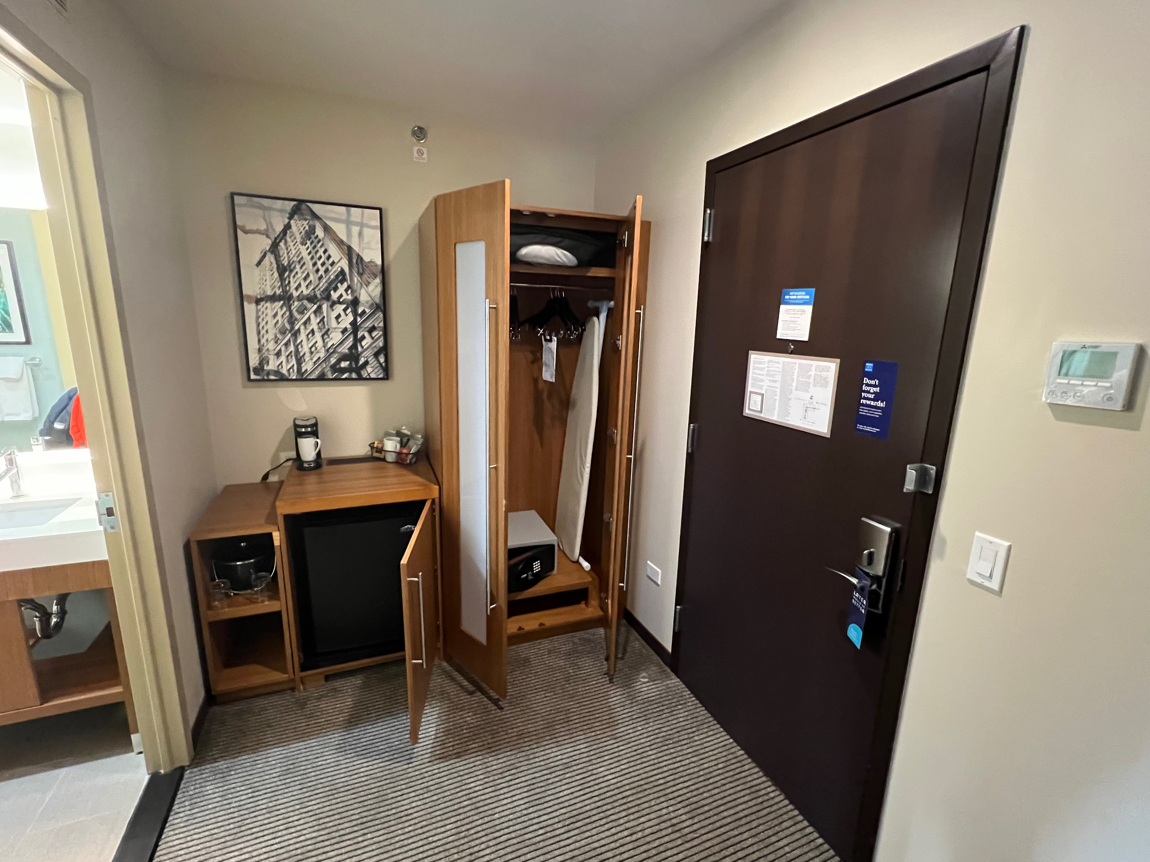 a room with a door and a closet